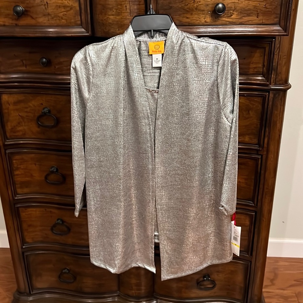 Ruby Road.  Brand new.  Silver top